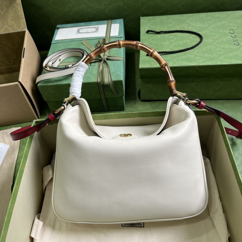 G*u*i top handle bags